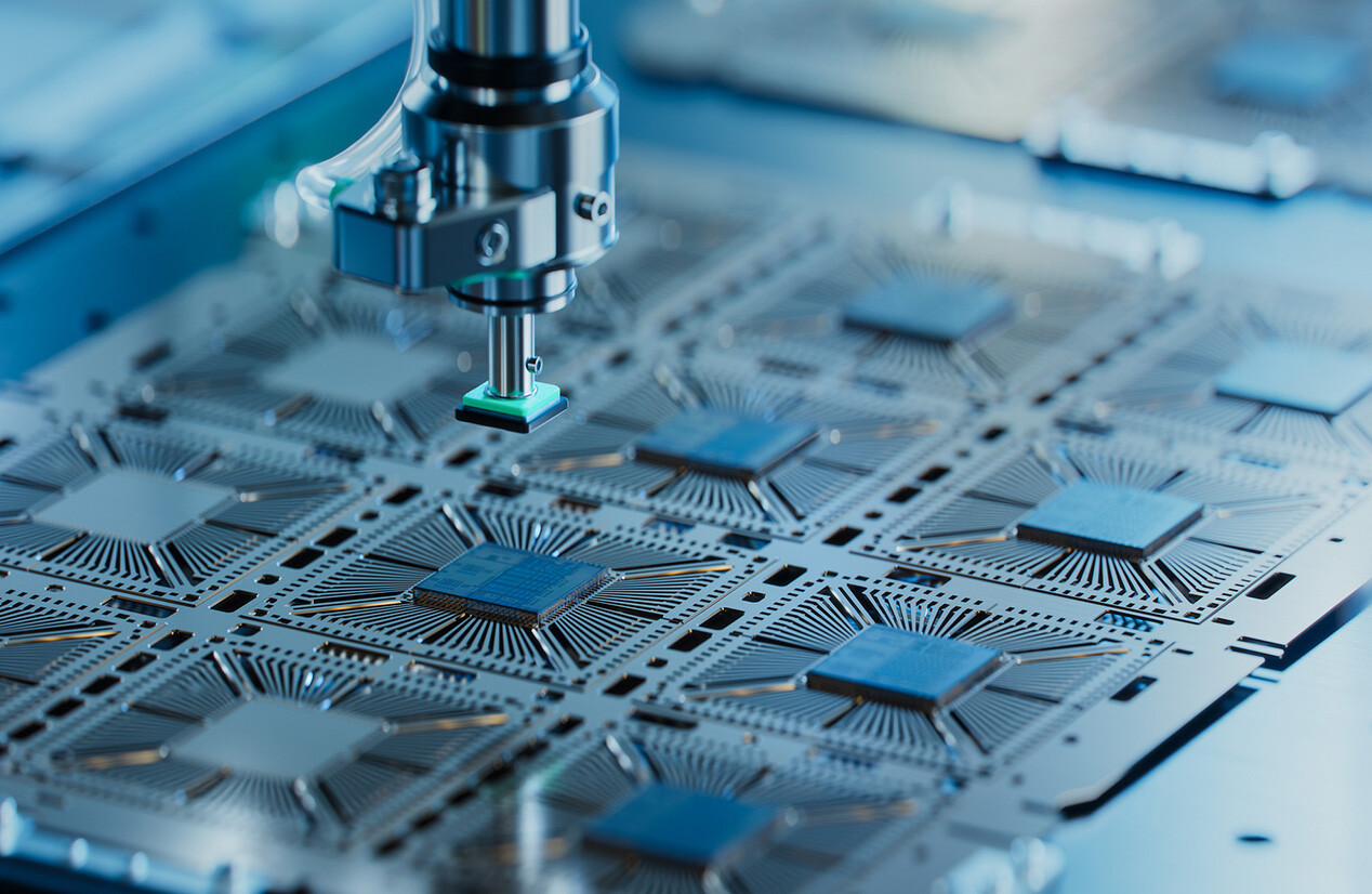 Close-up of Silicon Die are being Extracted from Semiconductor Wafer and Attached to Substrate by Pick and Place Machine.