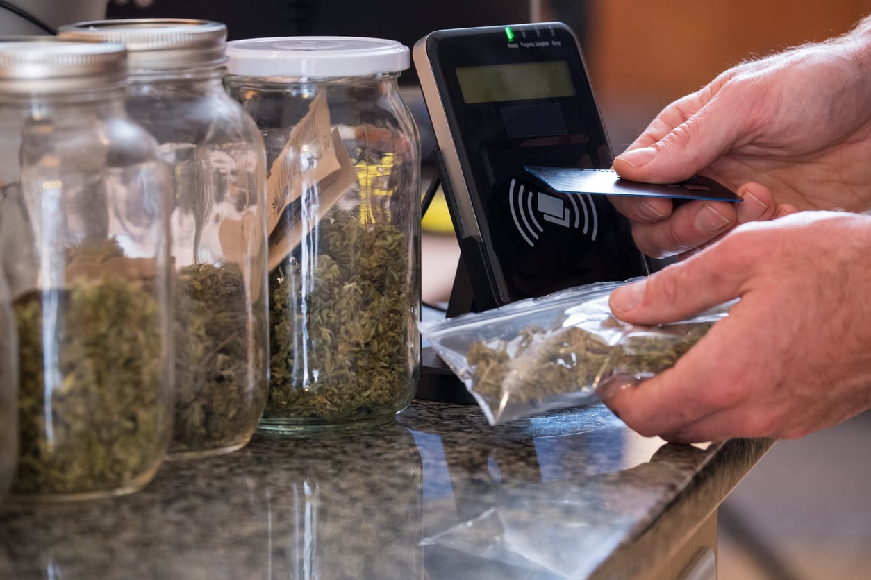 Purchasing legal marijuana at a dispensary Purchasing legal marijuana at a dispensary
